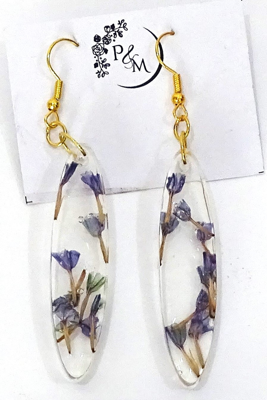 Earrings with preserved purple and blue flower